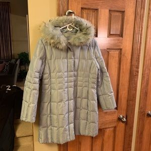 Mint green winter coat with raccoon fur trim